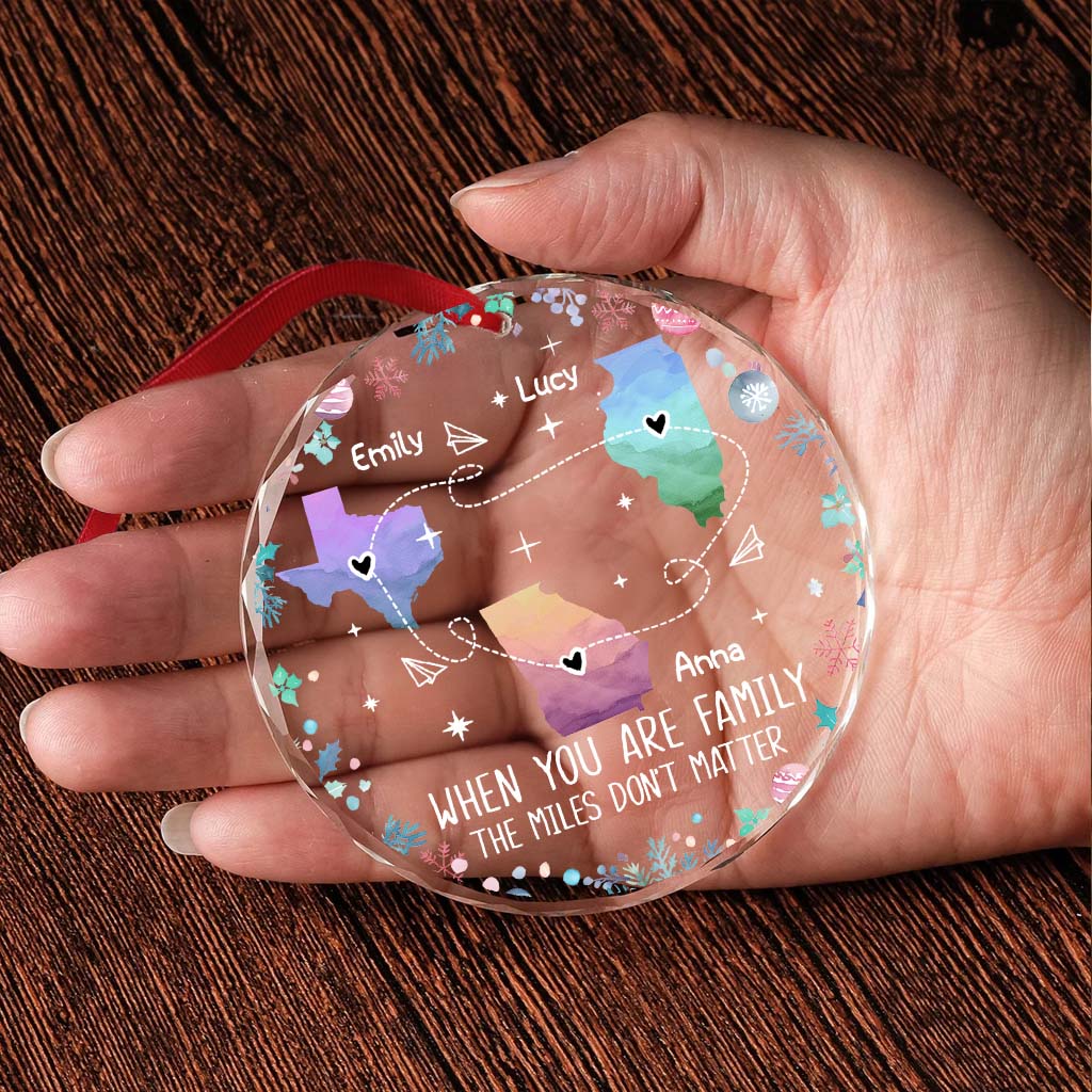 The Love Between Family Knows No Distance 
- Personalized Family Round Shaped Glass Ornament